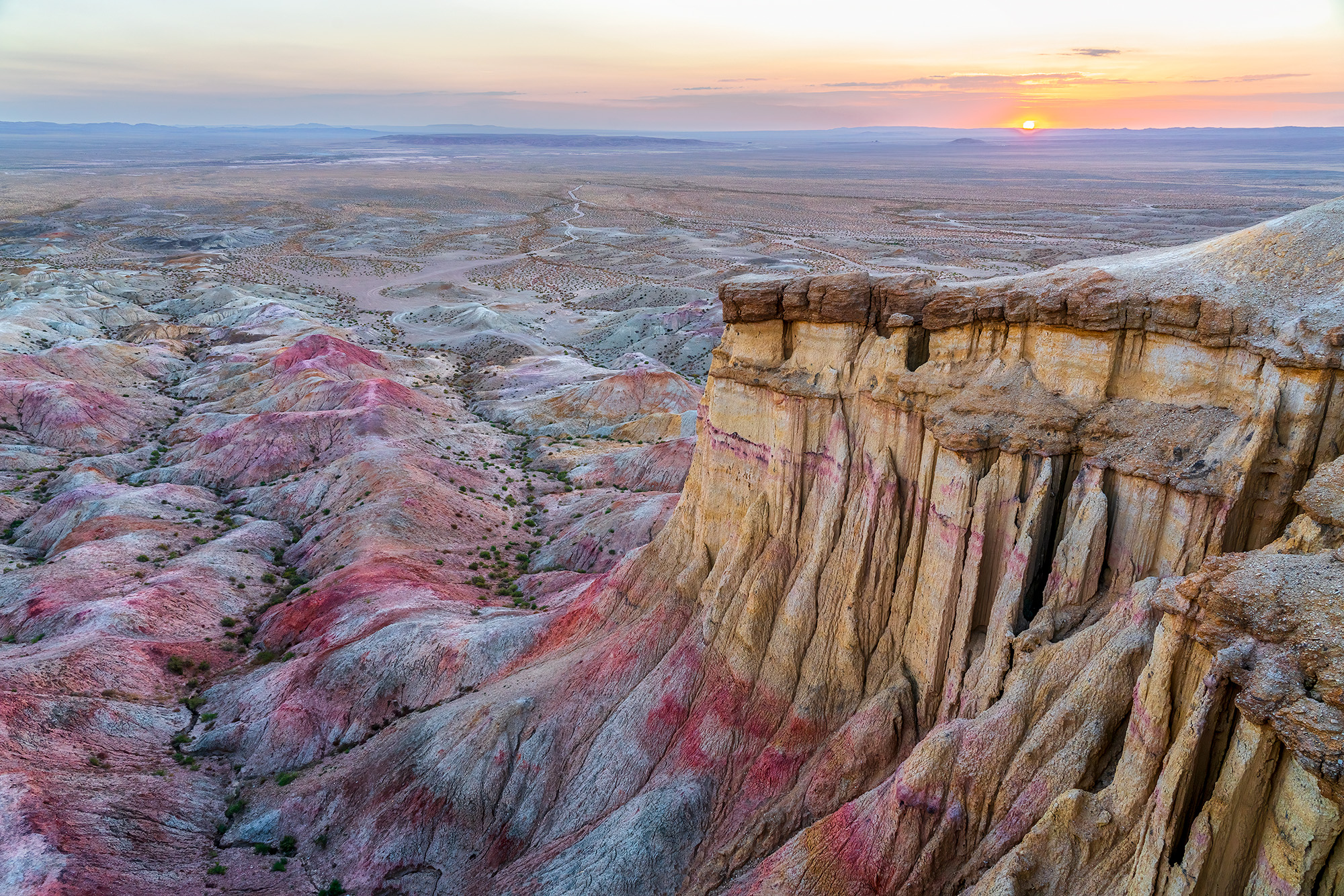 Tsagaan Suvarga White Stupa eroded cliffs at sunset
